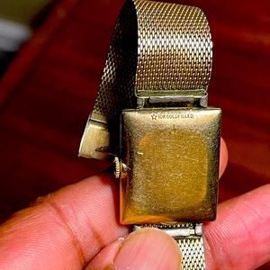 Vintage 10 karat gold filled Longines diamond men’s winding wrist watch.